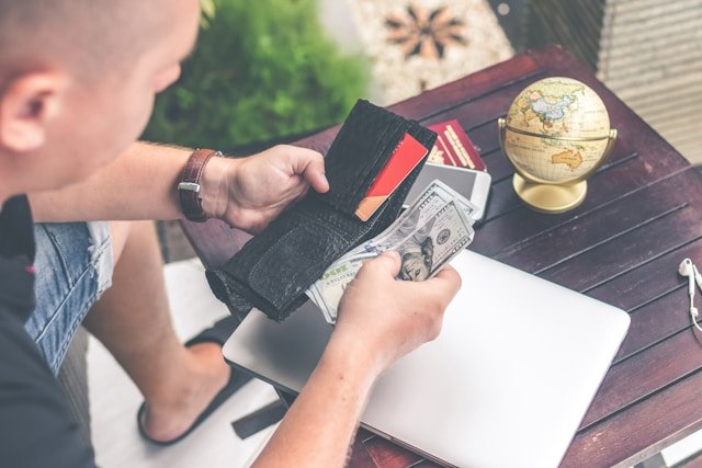 Person calculating their budget